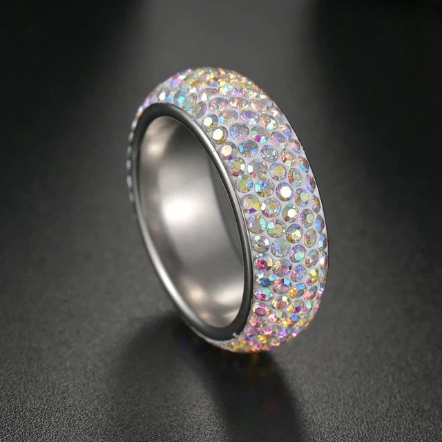 Pierścionek obrączka okrągła srebrna opalizujące cyrkonie - stal chirurgiczna.jpg