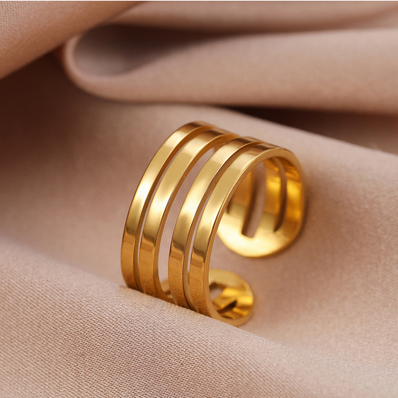 Pozłacany pierścionek uniwersalny cztery paski - stal chirurgiczna